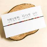 Bratara mesaj cod Morse "NEVER GIVE UP"-ceramica placata cu Aur